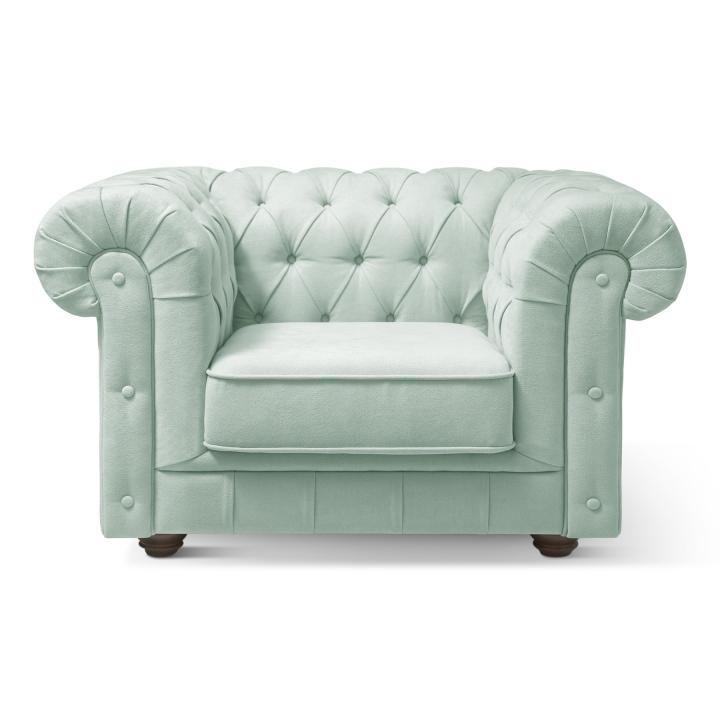 Sillón Chesterfield con capitoné real tapizado en tela