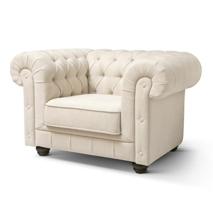 Sillón Chesterfield con capitoné real tapizado en tela