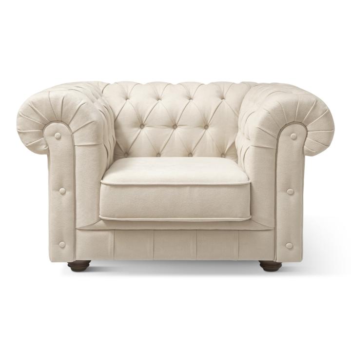 Sillón Chesterfield con capitoné real tapizado en tela