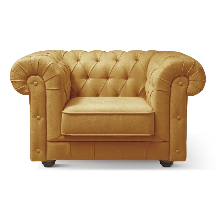 Sillón Chesterfield con capitoné real tapizado en tela
