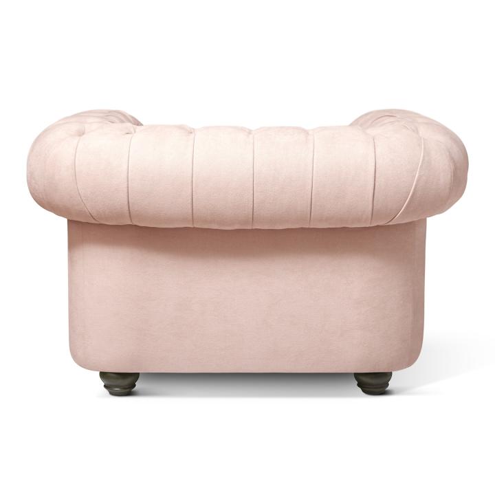 Sillón Chesterfield con capitoné real tapizado en tela