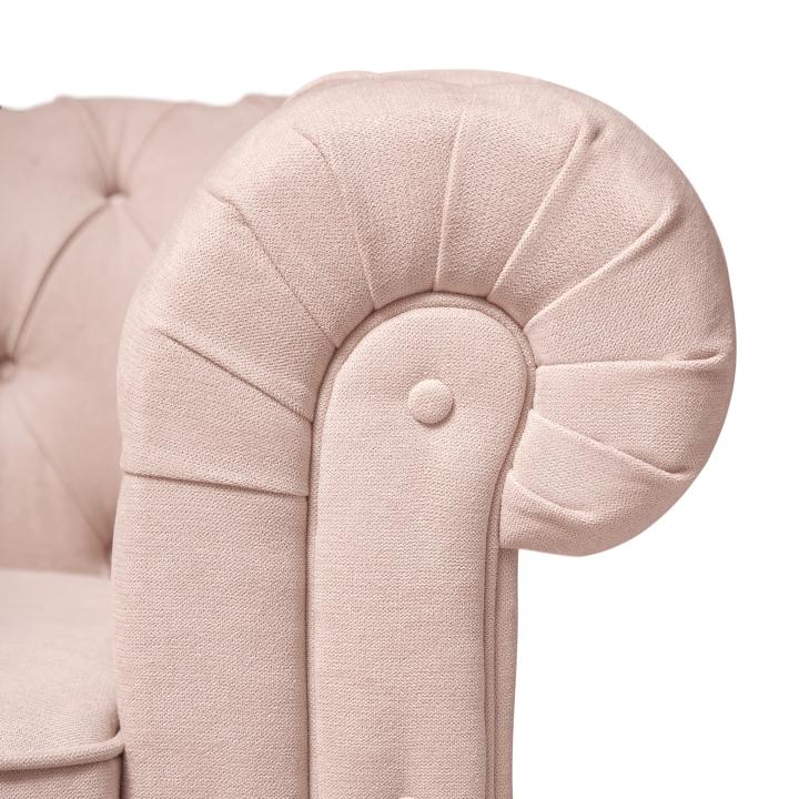 Sillón Chesterfield con capitoné real tapizado en tela