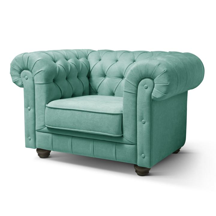 Sillón Chesterfield con capitoné real tapizado en tela