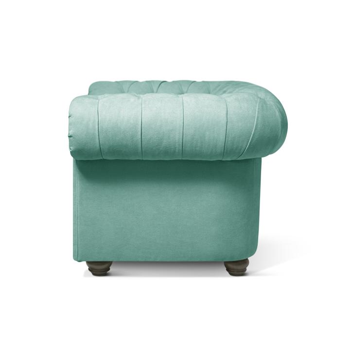 Sillón Chesterfield con capitoné real tapizado en tela